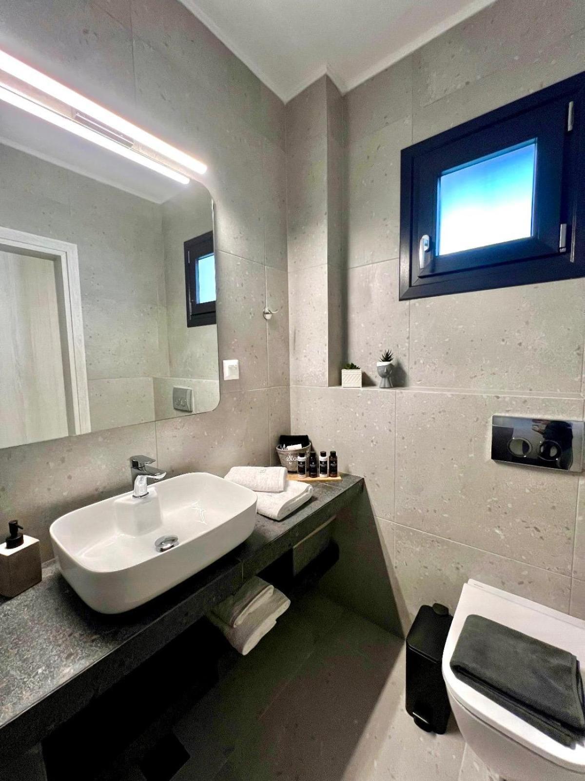 Four Shades Luxury Suites Sarti Buitenkant foto